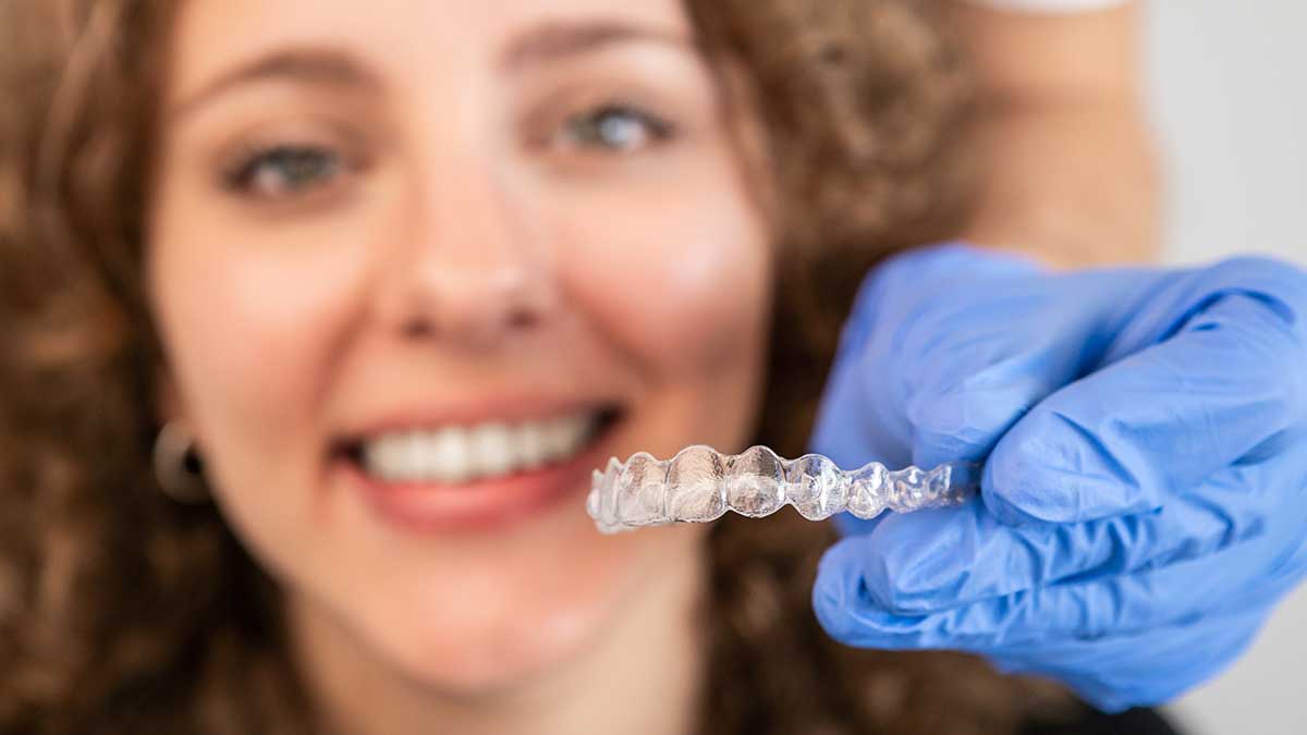 Adjusting and placing Invisalign